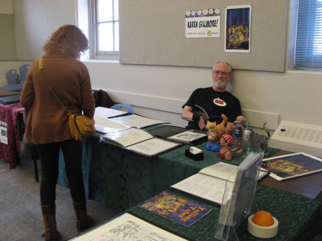 My sweet and ever-patient hubby sat the table most of the day while I ran around and bought comics, chatted up the guests, went to talks in the auditorium, and helped run a comics-making session.