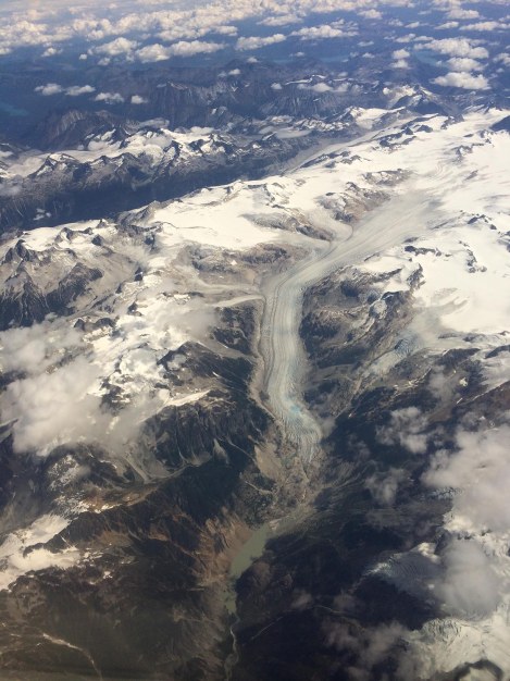 I took a lot of photos from the air on the way to Whitehorse, This is a glacier — it was huge!