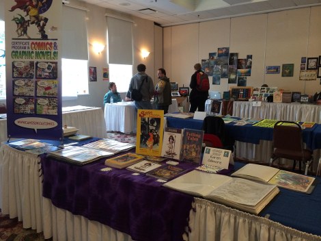 Here's my table at the convention in Artists' Alley. Three books, the entire portfolio of the original Spam paintings, and a couple of portfolios full of prints!